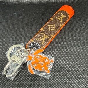 ✅ PRICE IS FIRM ✅ Fashion Monogram Orange and Brown Keychain